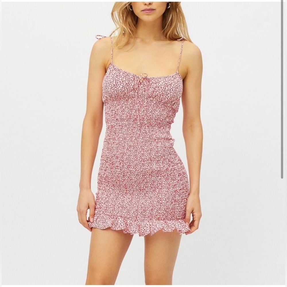 Kiss The Sky Shirred Ruffle
Mini Dress